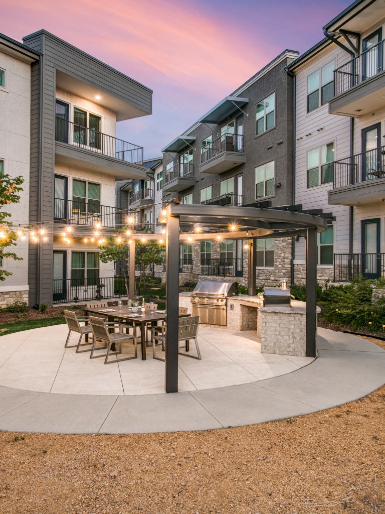 Outdoor dining patio with bistro lighting